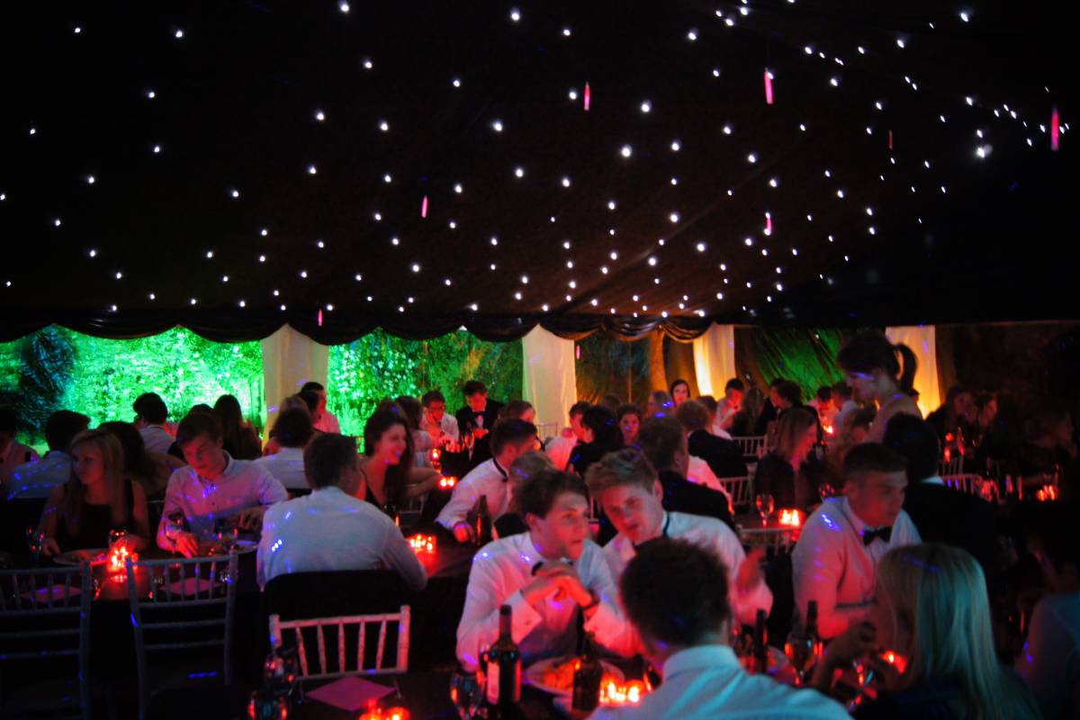 Eighteenth birthday in blacked out marquee