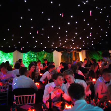 Eighteenth birthday in blacked out marquee