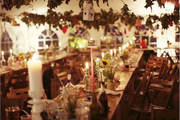 Vintage style wedding reception romantic by candlelight