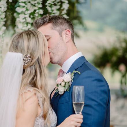Bride and groom share a kiss