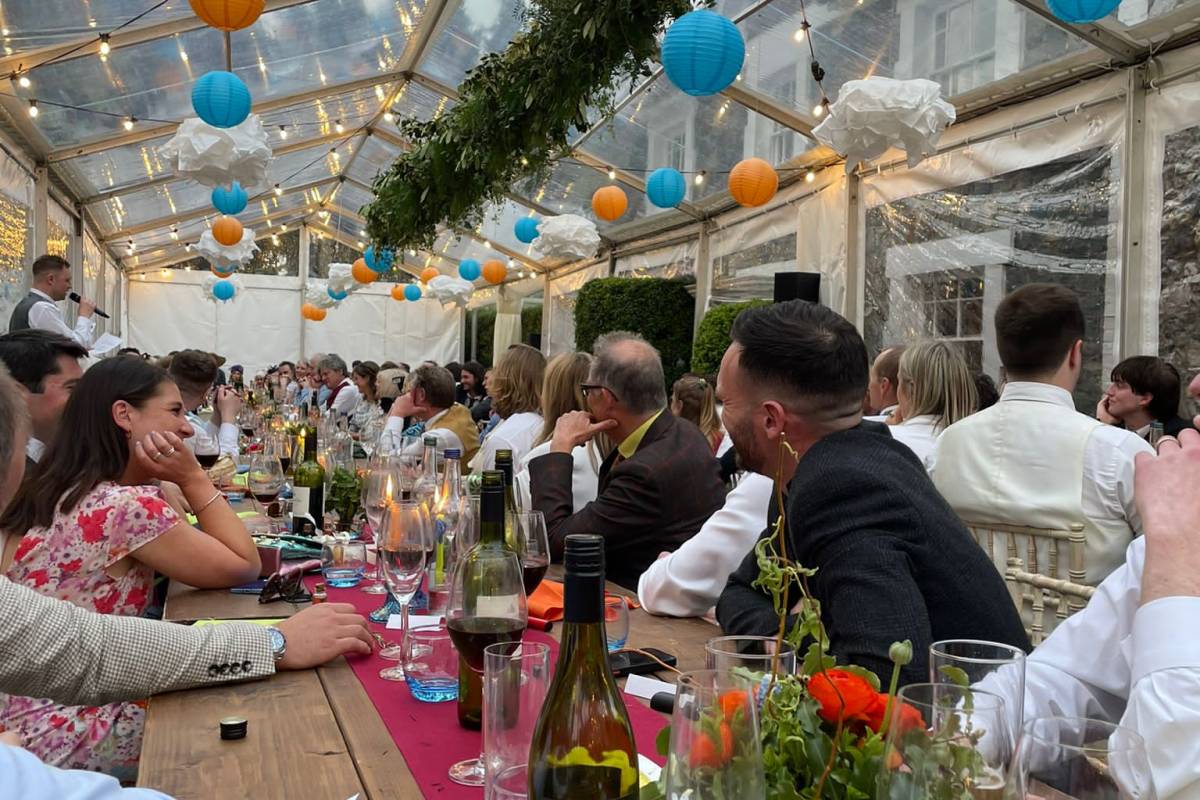 Eating in a transparent marquee