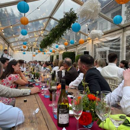 Eating in a transparent marquee
