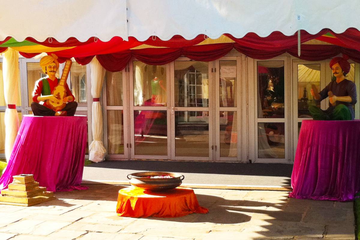 Marquee entrance with musician figures
