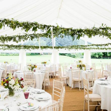 Leafy roof decoration in wedding marquee