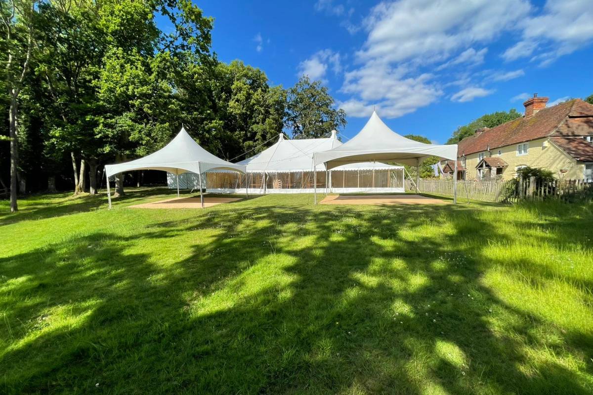 Two chinese hat marquees flanking a single frame marquee
