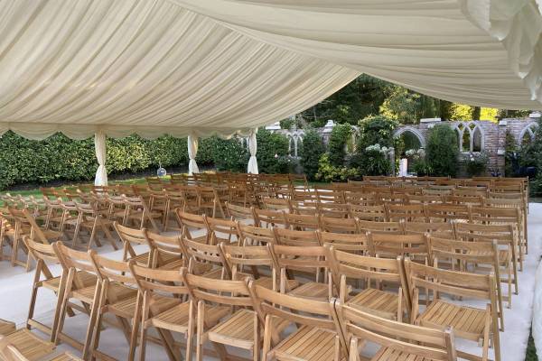Wedding blessing with folding wooden chairs