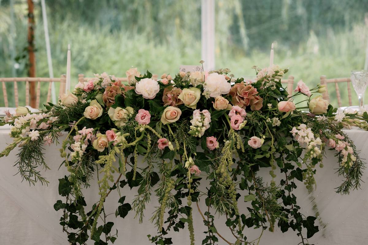 Pink and white flowers for the top table