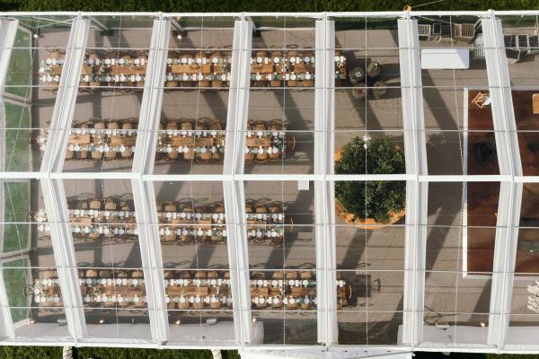 Drone view right over clear wedding marquee