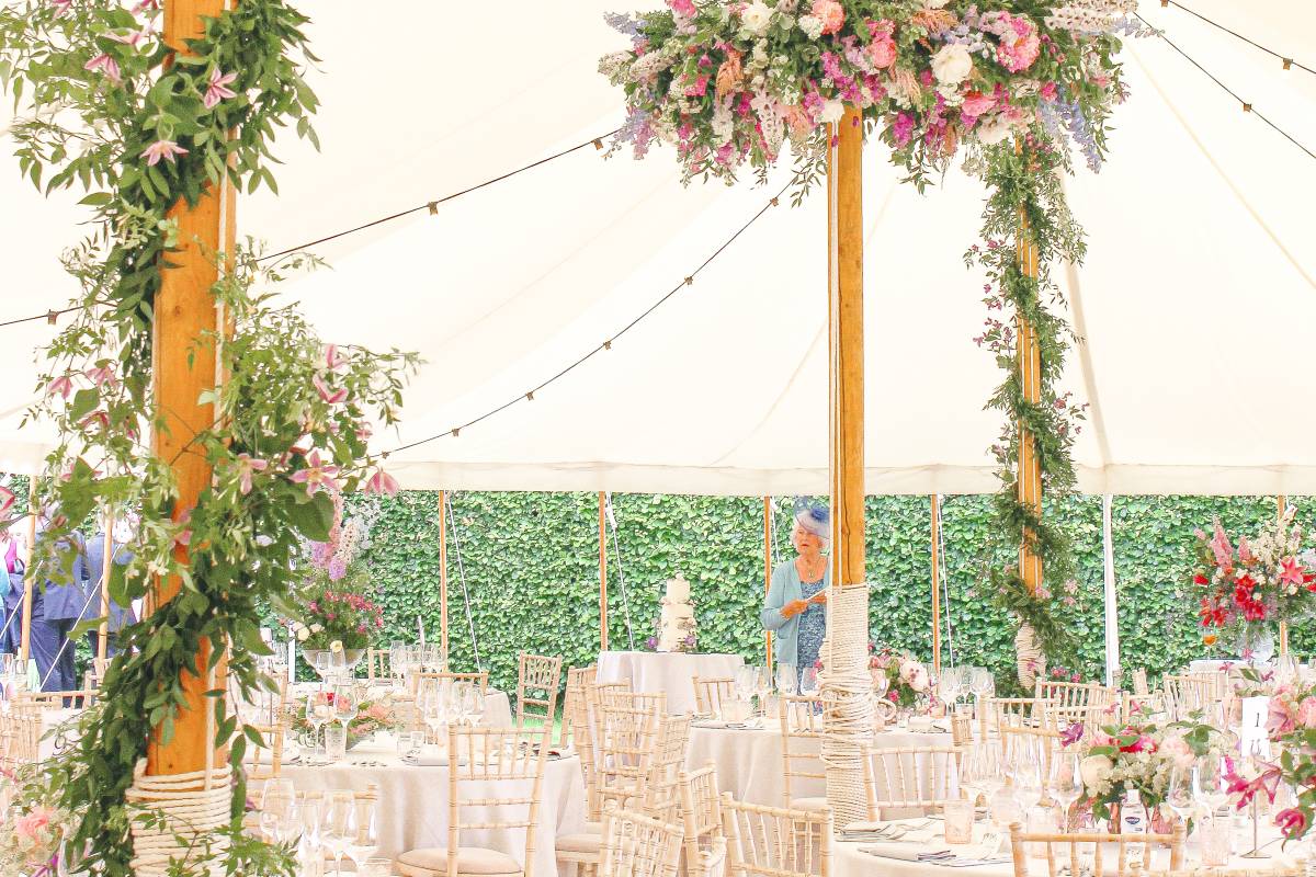 Flowery decoration in a wedding marquee