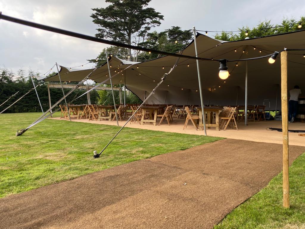 Stretch tent interior with rustic furniture