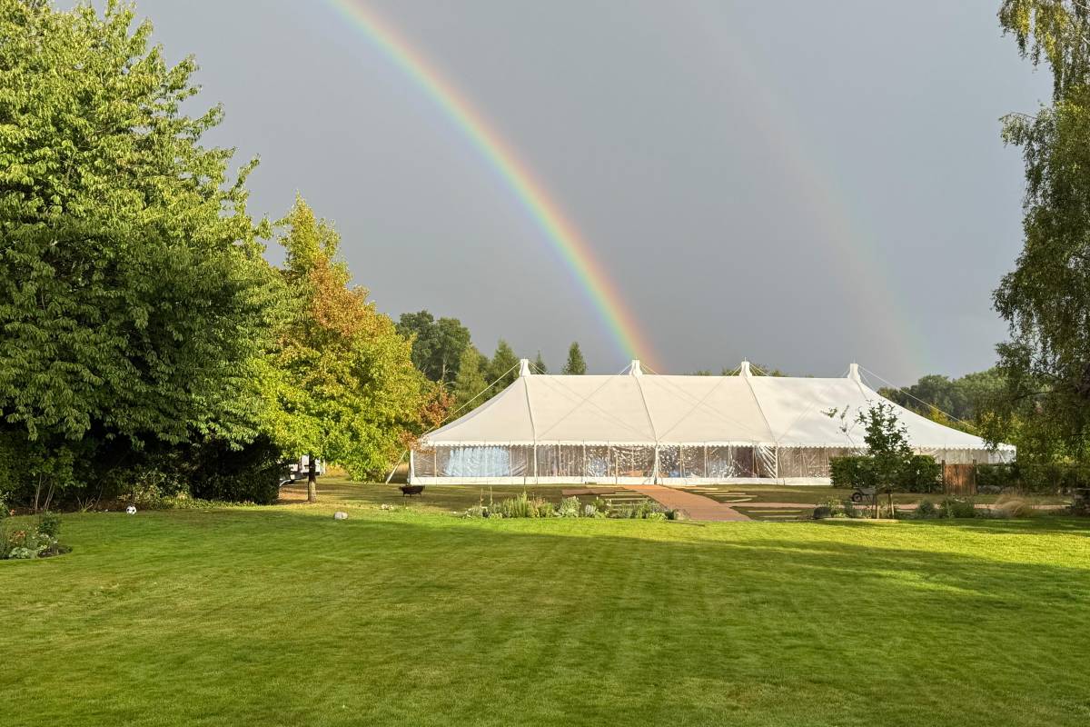 Traditional tent with a rainbow