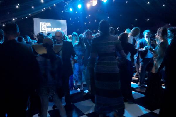 Dancing in disco styled marquee