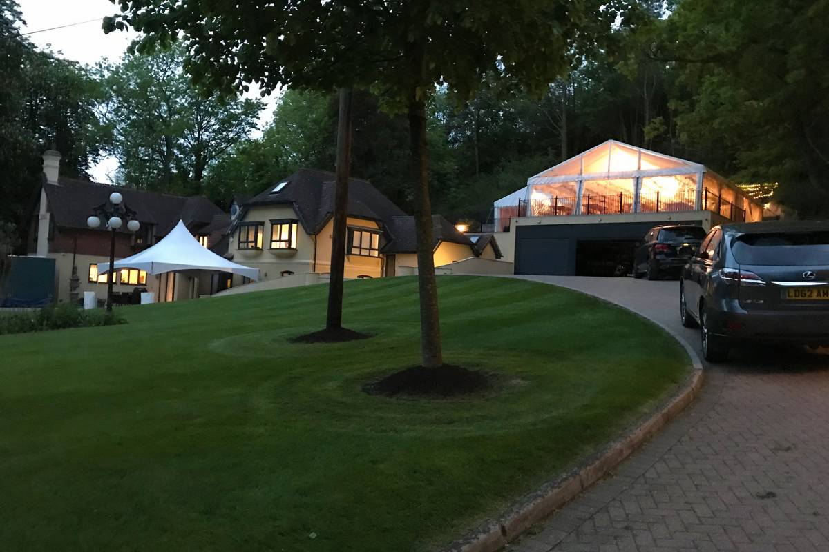 Marquee on top of a garage