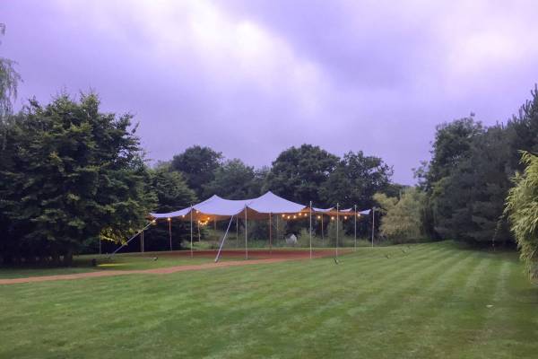 Stretch tent on grass