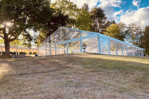 Large transparent marquee on a hill
