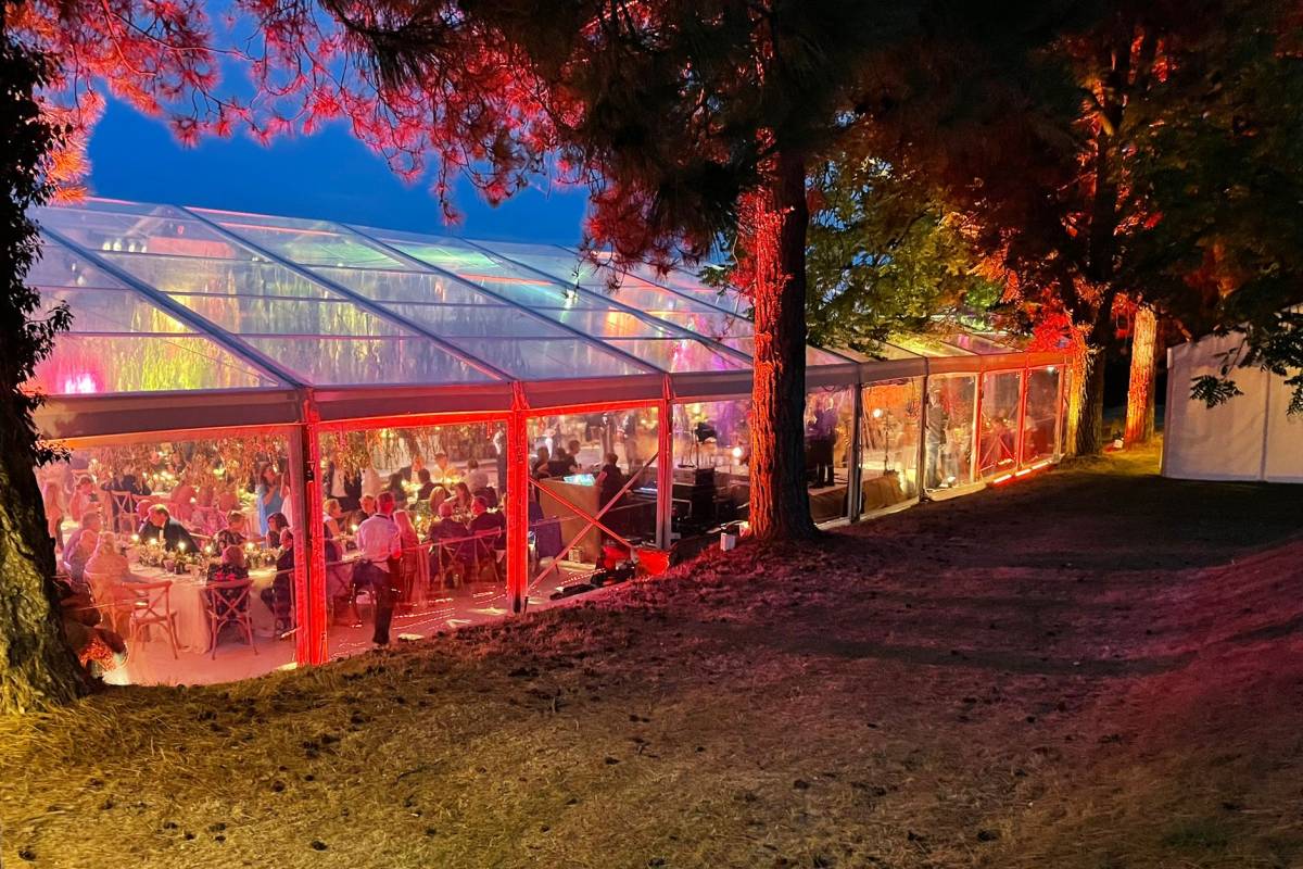 Exterior of brightly lit clear marquee