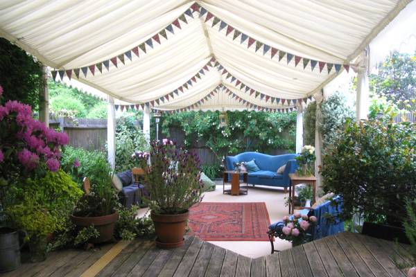 Art Deco styled marquee in narrow garden