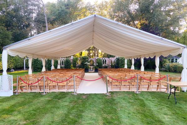 Marquee set up for outdoor wedding ceremony