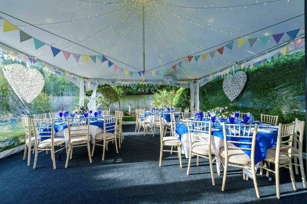 Interior of a small wedding in a Chinese Hat marquee