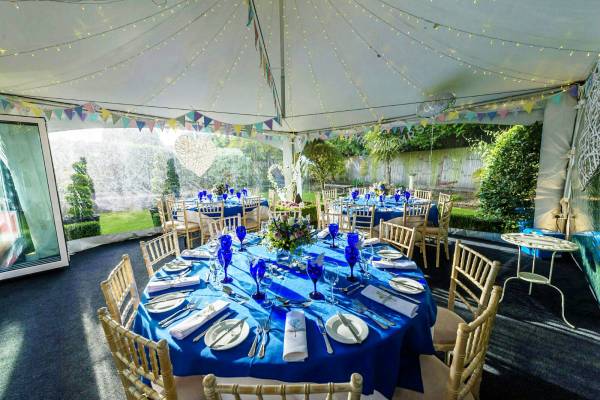 Interior of a small wedding in a Chinese Hat marquee