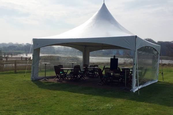 Pagoda tent with clear panoramic windows for an intimate party