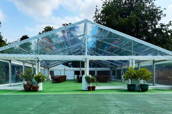 Clear marquee on a tennis court