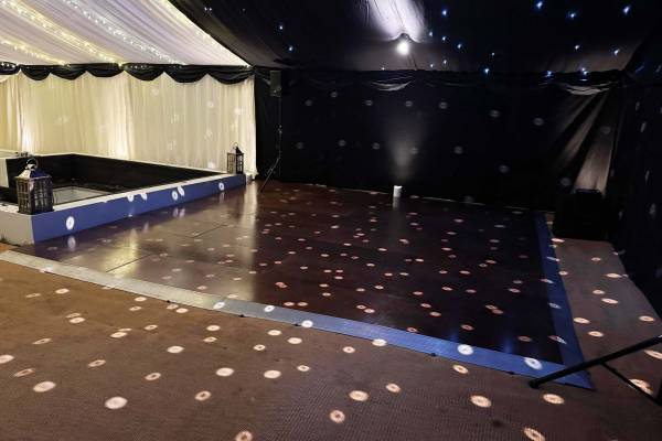 Lights revolving over a dance floor