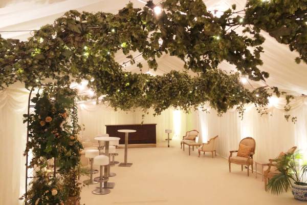 Uplighters in a medium sized marquee