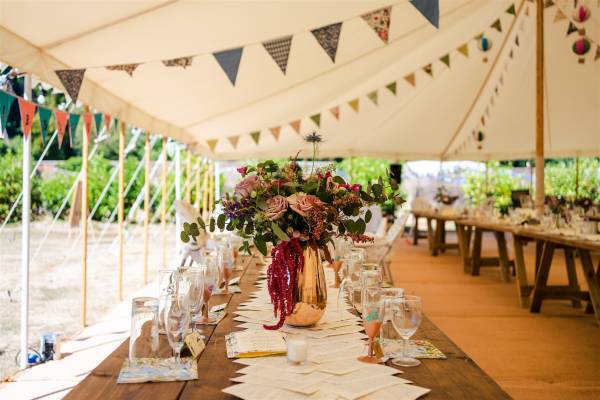 Rustic styled wedding marquee.