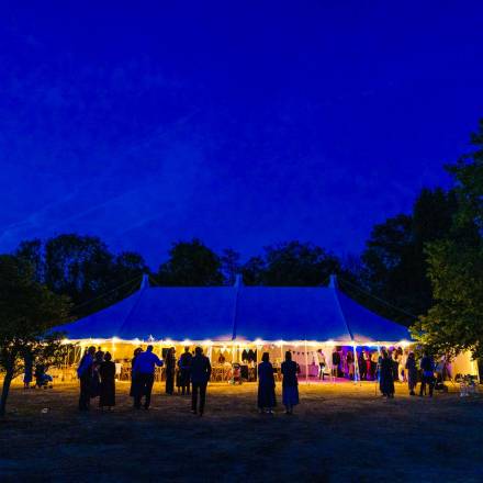 Open sided traditional marquee at night