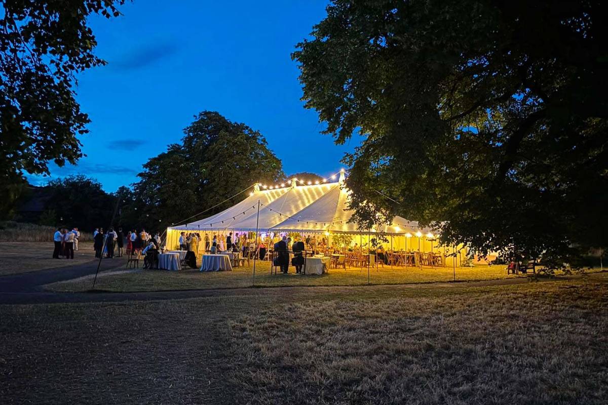 Traditional tent lit up at night
