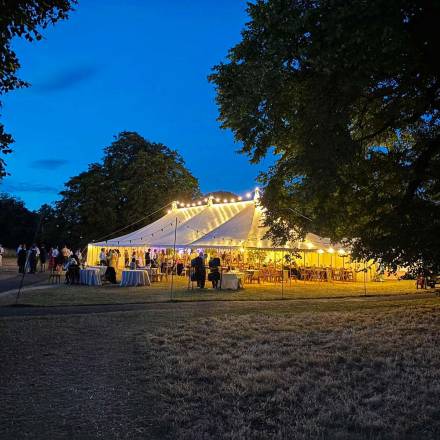 Traditional tent lit up at night