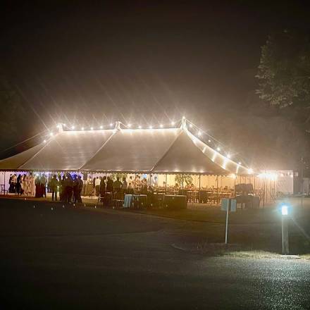 Traditional tent lit up at night
