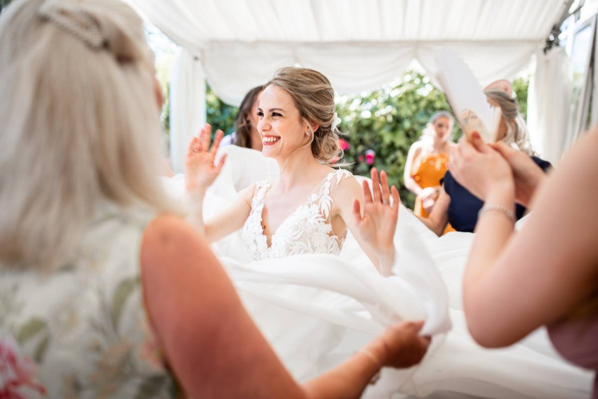 Delighted bride dancing