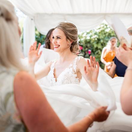 Delighted bride dancing