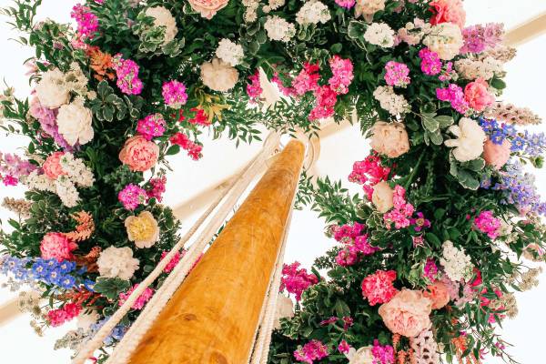 Floral ring on top of a pole
