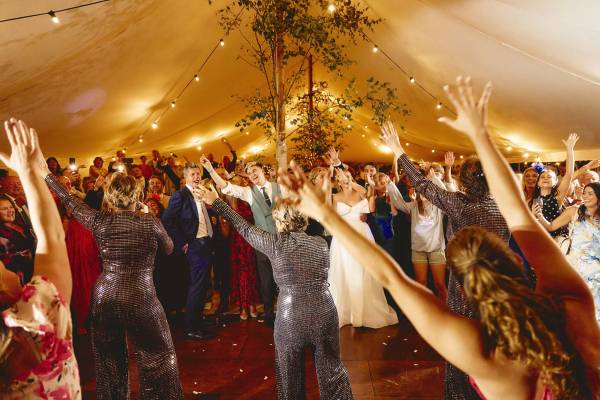 Dancing altogether at a wedding